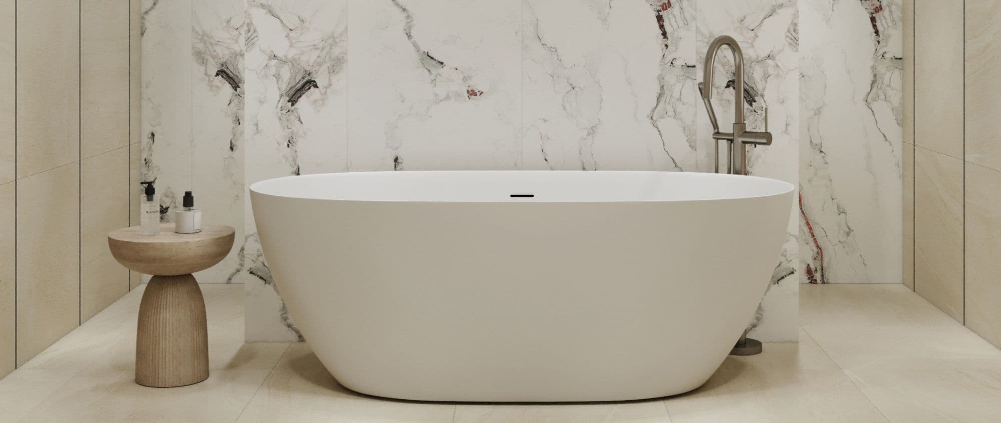 Luxury freestanding bathtub against dramatic white marble slab walls